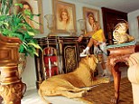 Outrageous: A woman with a tennis racquet poses with a young male lion amid opulence 