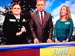 Gee, that's strict! Sajak, center, informed Durette, left, and Vincenti, right, that the former's answer was rejected because she pronounced it in the vernacular 