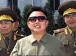 Tyrant: North Korea's late leader Kim Jong-il accompanied by military staff ahead of a military inspection