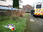 Tribute: Flowers have been left close to the home where a toddler's body was discovered this morning 