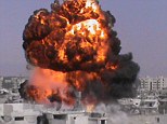War games: An explosion in the Syrian city of Homs last month. It has been now been suggested via hacked emails from a defense contractor that the U.S. backed the use of chemical weapons to spur international military intervention