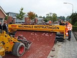 Invention: The machine is the brainchild of Henk van Kuijk after he decided that kneeling to lay the bricks was too labour-intensive