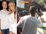 The 26-year-old was taken into custody yesterday over the killing of Reeva Steenkamp, 30, after he allegedly shot her four times in the head, chest and arm.