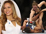 'Rowdy Ronda' Rousey uses elbow-breaking signature move to win historic women's Ultimate Fighting Championships debut