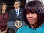 Michelle Obama has revealed that her husband is still learning to cope with watching his daughters, 14-year-old Malia and 11-year-old Sasha, become teenagers.