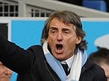 Vote of confidence: City's chief executive Soriano called manager Mancini (above) a 'champion'