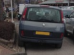 Badly parked: A Renault MPV mounted up on a kerb