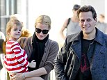 In the festive spirit: Ioan Gruffudd and Alice Evans pick up daughter Ella after her school play, dressed as Rudolph