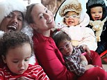 Presents everywhere! Mariah Carey shares family Christmas snaps of 'Dem Babies' in Aspen