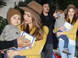 A family united! Orlando Bloom and Miranda Kerr look happier than ever as they leave friend's house with baby Flynn 