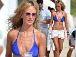 Here's the skinny! Lady Victoria Hervey shows off bony frame in blue bikini... on the sand in Miami Beach