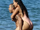  Rapper Ludacris was spotted shirtless playing in the ocean with his girlfriend Eudoxie in Maui