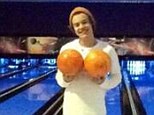 Nice pair: Harry Styles posted a picture of himself at a bowling alley with a couple of balls held up in a cheeky position