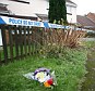 Tribute: Flowers have been left close to the home where a toddler's body was discovered this morning 