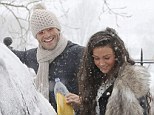 She's my snow bunny! Mark Wright flings snow on his new girlfriend Michelle Keegan as they clear his car in Abridge, Essex on Sunday