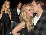 It's official! Real Housewives star Adrienne Maloof, 51, confirms her romance with Rod Stewart's bad boy son Sean, 32, as couple put on PDA 