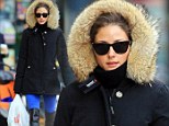 Going Arctic! Olivia Palermo stays warm and fashionable in furry coat and designer boots in chilly New York