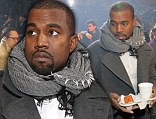 A forlorn Kanye West looked lonely without beau Kim Kardashian as he takes his seat at Paris fashion show 