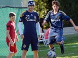 EXCLUSIVE: Brooklyn Beckham looks set to follow in father David's footballing footsteps as he is trialled for Chelsea FC