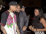 Flirty: Chris Brown greets a female clubber outside the Supper Club in Hollywood on Tuesday night