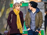 Lovers and friends: Harry Styles and Taylor Swift, pictured in December 2012, are reportedly going to get back together this weekend in Cannes, France