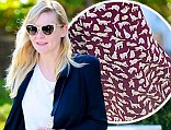 Kirsten Dunst heads out to a waiting car in Los Angeles wearing cat print trousers
