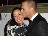 Old fashioned: Sacked America's Next Top Model judge Nigel Barker smooched his wife Cristen in New York on Wednesday 