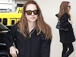 The actress wrapped up in a cosy woolen coat, simple black trousers and a thermal pair of padded boots as she jetted out of Los Angeles on Wednesday.