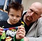 Six-year-old Eddie Thompson, who was told by his school he was not allowed to wear a Christian band around his ankle, pictured with his father Peter Thompson, 39