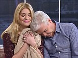 Sore heads: Holly Willoughby and Phillip Schofield seemed more than a little worse for wear as they appeared on This Morning on Thursday after a wild night out at the National Television Awards