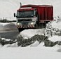 An ice road trucker passes through deep snow near Brough, Cumbria, this morning after recent heavy snowfalls. More snow is expected in the north on Friday