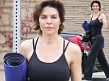 Thumbs up for me! Botox fan Lisa Rinna, 49, displays her fresh-faced and line-free face as she heads to a yoga session