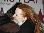Comfort: Jessica Chastain gave a crying fan a hug as she left the theatre on Tuesday 