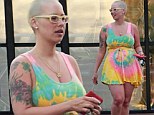 New mother Amber Rose makes a bid for freedom as she leaves newborn Sebastian at home for a trip to the shops