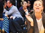 Floor violation! Kaley Cuoco tries to resist calling timeout on the touchy-feely couple next to her at the Lakers game