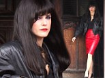 Who's the vamp? Keri Russell goes undercover in long black wig and red skirt for The Americans