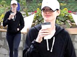 Make-up and fancy free! A barefaced Anne Hathaway keeps fit and healthy as she enjoys break from the movie scene