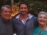 Family guy: Gerard Butler posted a picture of himself and his parents to his Twitter page on Monday night 
