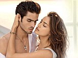 Come closer: Russian model Irina Shayk gets a little close to a male model as she takes part in a glossy photoshoot
