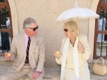 Moment in the shade: The Royal couple are on the fourth and final leg of a tour of the Middle East taking in Jordan, Qatar, Saudia Arabia and Oma