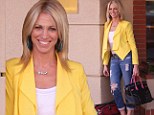 Still got it! Eighties favourite Debbie Gibson, 42, holds on to her Electric Youth in torn jeans and bright yellow jacket