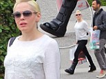 In the wars again: Rose McGowan was seen sporting a new foot cast in Los Angels, on Monday