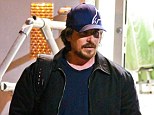 Bulked up: Christian Bale was sporting a much stockier frame than usual as he got to work on the set of a new untitled David O. Russell film in Boston, Massachusetts, on Monday