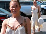LeAnn Rimes is beaming as she shows off her healthier figure in floaty bohemian dress