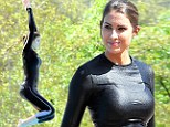 All the right curves! Katherine Webb shows off her perfect figure AND somersault during diving practice on Splash