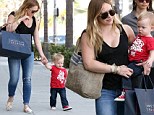 These Converse were made for walking! Hilary Duff's son Luca is steady feet after celebrating his first birthday