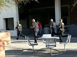 Report of gunman carrying rifle on University of Arizona campus places buildings under lock down