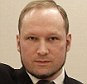Mass murderer Anders Behring Breivik, seen here making a salute at his trial in Oslo, is pleading to be let out of jail to attend his mother's funeral