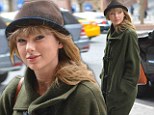 Trying to ward the boys off? Taylor Swift steps out in uncharacteristically frumpy duffel and hat combination 