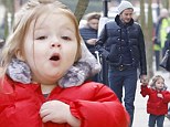 Becks and his little lady in red: David and daughter Harper co-ordinate in quilted jackets and matching trainers